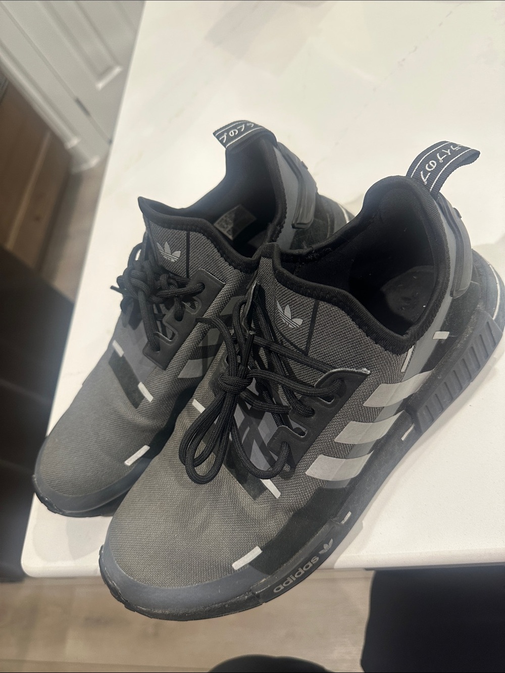 Adidas NMD men’s black and gray tennis shoes men’s size 9